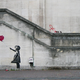 Banksy Girl and Heart Balloon. Credit: Dominic Robinson/Flickr/CC BY-2.0